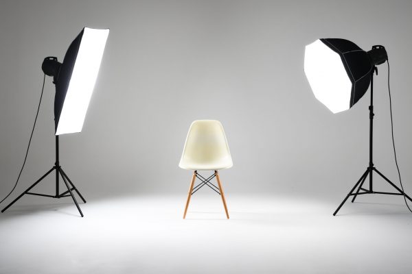 Photography Studio with Empty Chair and Flash Lights