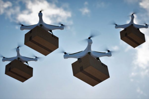 Delivery drones flying with packages. Shipping, delivery and safe and fast delivery.