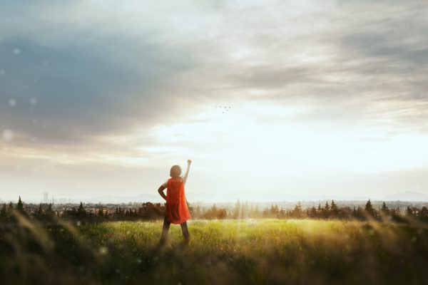 child dreaming of superpowers