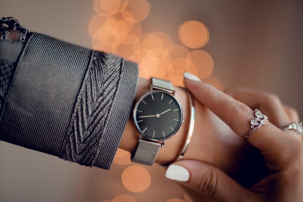Stylish watch on woman hand